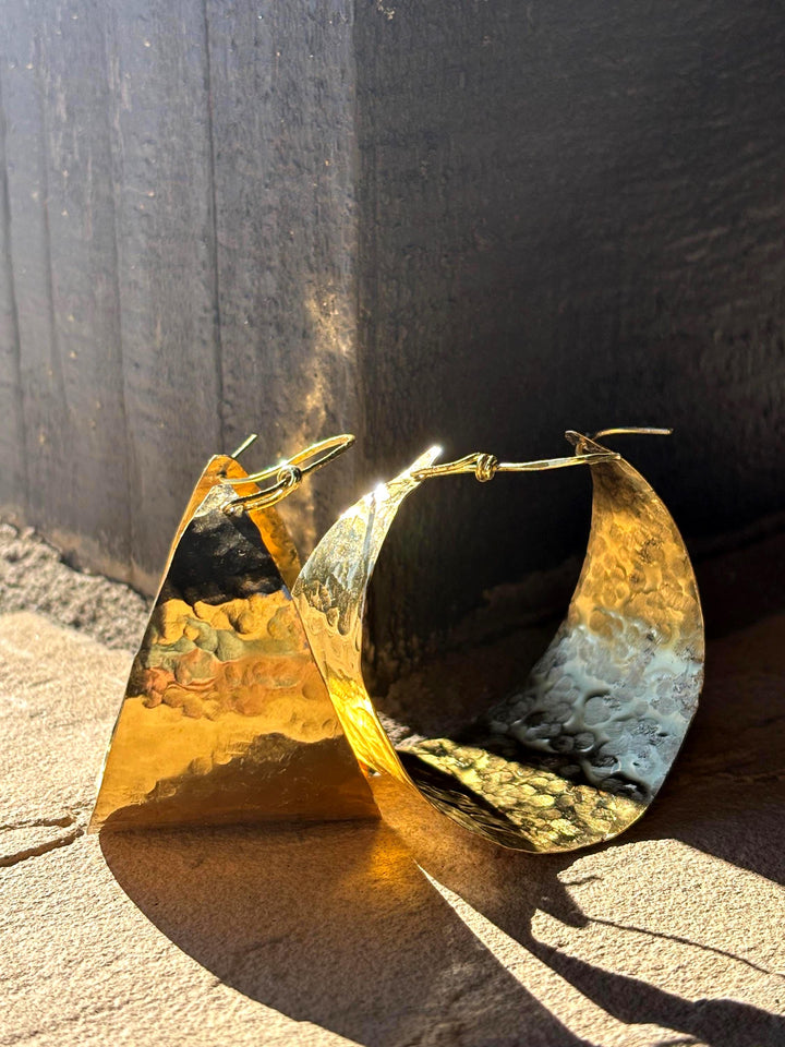 Are these bold hammered brass hoop earrings comfortable for all-day wear?